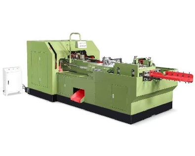 Multi-station heading machine